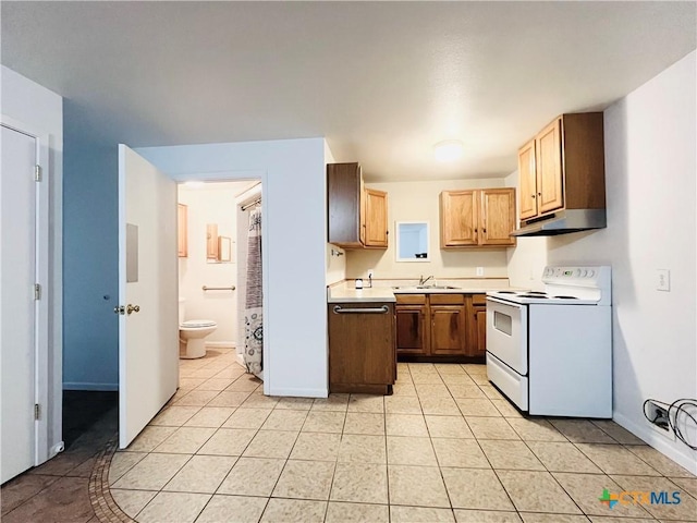 kitchen with sink, light tile patterned floors, and white electric range