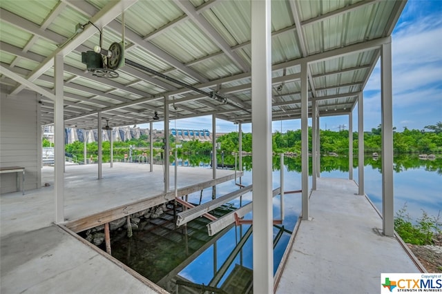 dock area featuring a water view