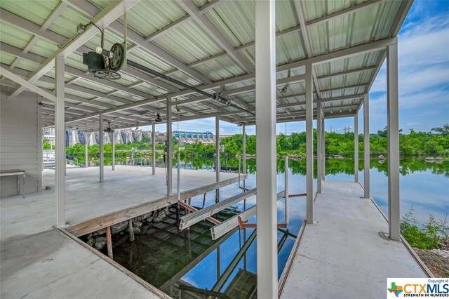 dock area featuring a water view