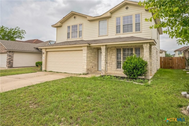 traditional home with a garage, a front lawn, fence, stone siding, and driveway