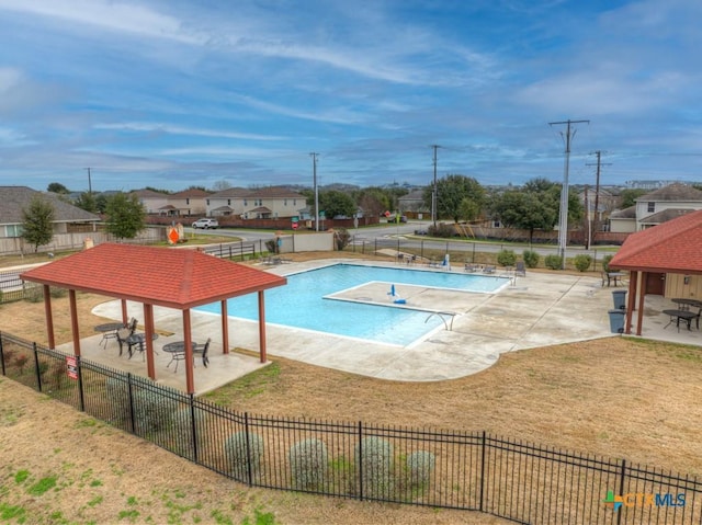 view of pool featuring a gazebo, a patio, and a lawn