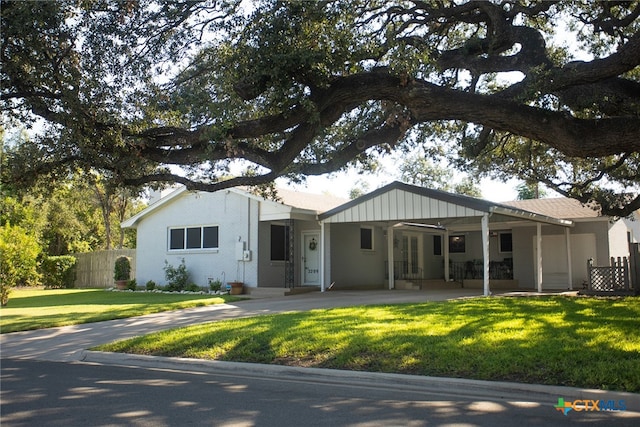 ranch-style house with a front lawn