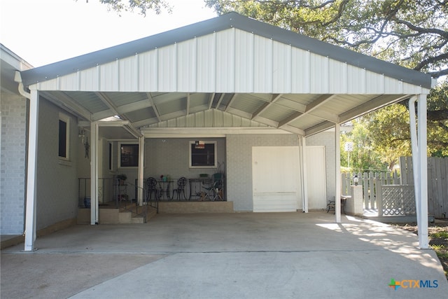 exterior space with a carport