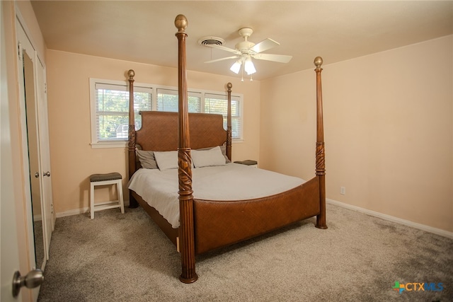 bedroom featuring ceiling fan and carpet floors