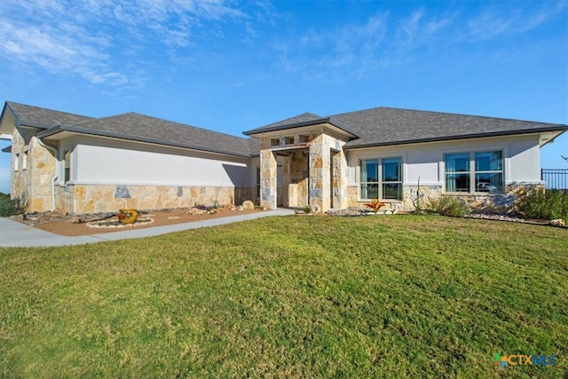 prairie-style home featuring a front yard