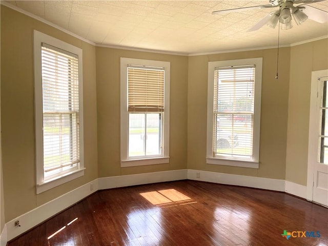 114 N Market St, Goliad, TX 77963 - spare room with ornamental molding, healthy amount of natural light, hardwood / wood-style flooring, and ceiling fan