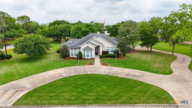 bungalow-style home featuring a front yard