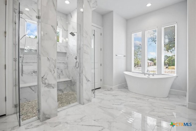 292 Scenic Cyn, New Braunfels, TX 78132 - full bathroom featuring a marble finish shower, healthy amount of natural light, a freestanding tub, marble finish floors, and recessed lighting