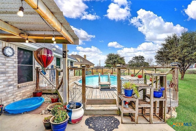 view of pool featuring a wooden deck