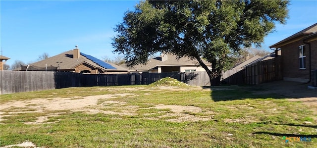 view of yard featuring a fenced backyard