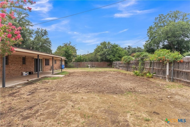 view of yard featuring a patio