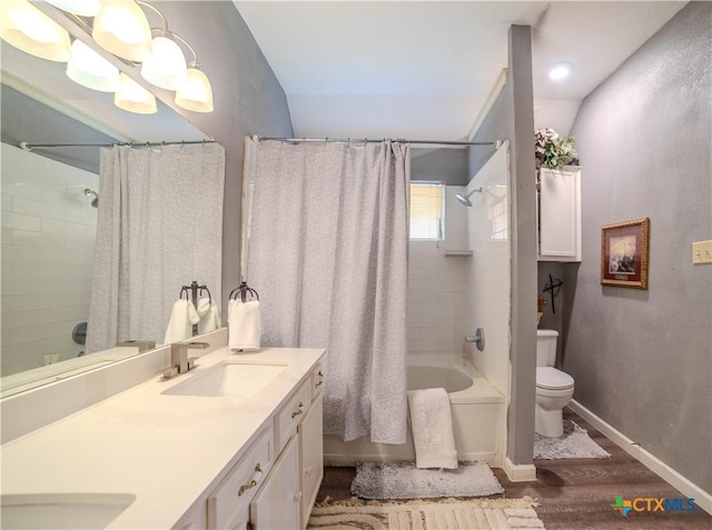 4108 Red River Cir, Temple, TX 76504 - bathroom featuring wood finished floors, shower / tub combo with curtain, and double vanity
