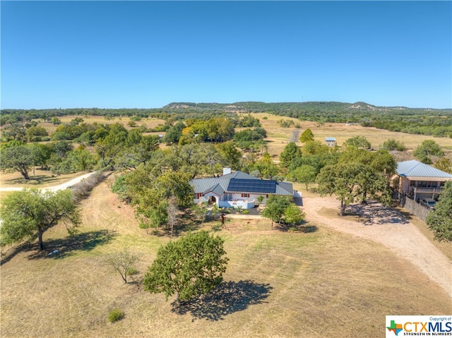 birds eye view of property featuring a rural view