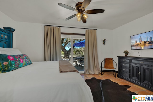 tiled bedroom featuring access to exterior and ceiling fan