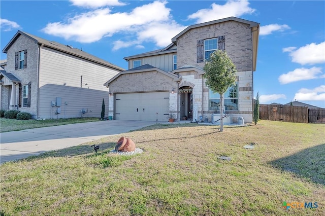 view of front of home featuring a front lawn, a garage, brick siding, and driveway