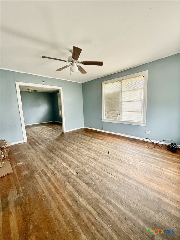 interior space featuring hardwood / wood-style floors and ceiling fan