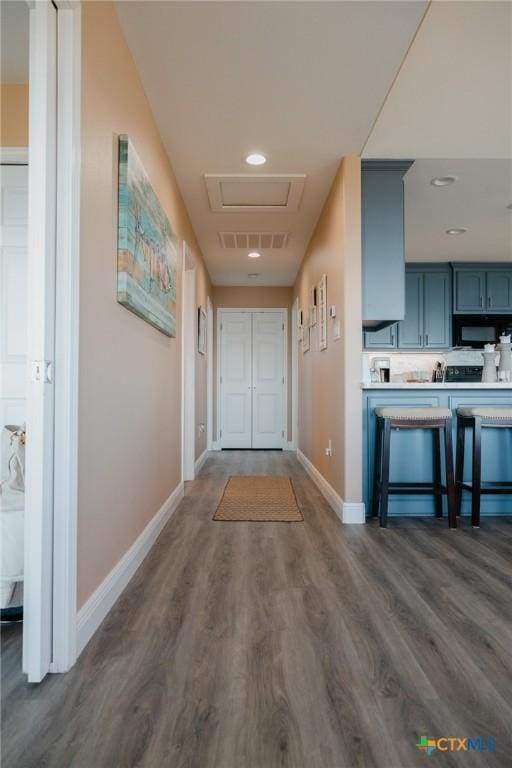 corridor with dark wood-type flooring