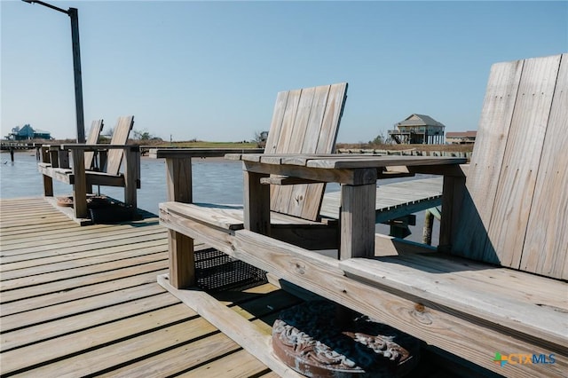 view of dock with a water view