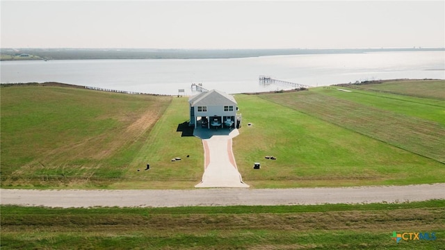 bird's eye view featuring a water view and a rural view