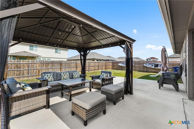 2020 Mallard Ct, Copperas Cove, TX 76522 - fenced backyard featuring an outdoor hangout area, a gazebo, and a patio