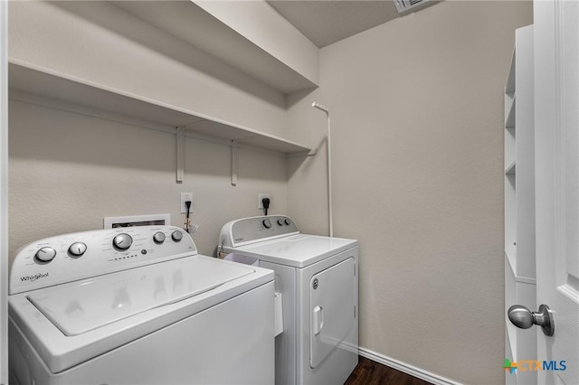 2020 Mallard Ct, Copperas Cove, TX 76522 - washroom with independent washer and dryer and dark wood-type flooring