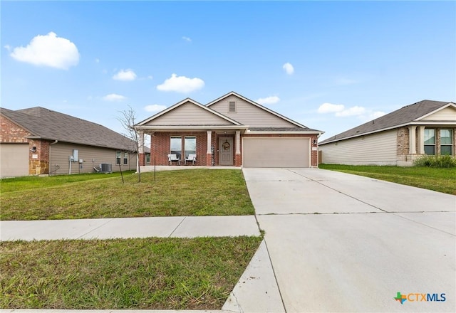 2020 Mallard Ct, Copperas Cove, TX 76522 - craftsman inspired home featuring brick siding, concrete driveway, a garage, a front yard, and covered porch
