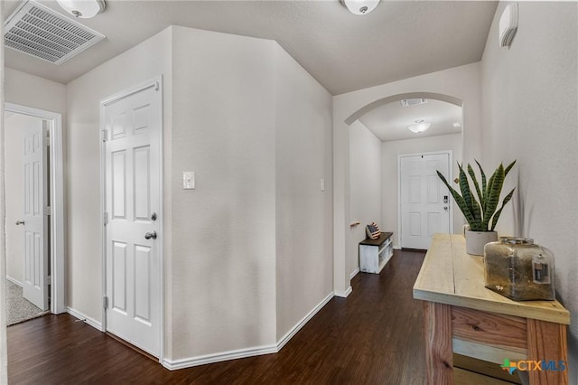 2020 Mallard Ct, Copperas Cove, TX 76522 - corridor featuring arched walkways and dark wood-style flooring