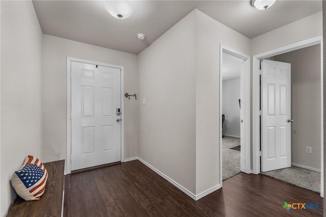 2020 Mallard Ct, Copperas Cove, TX 76522 - foyer with baseboards and dark wood-type flooring