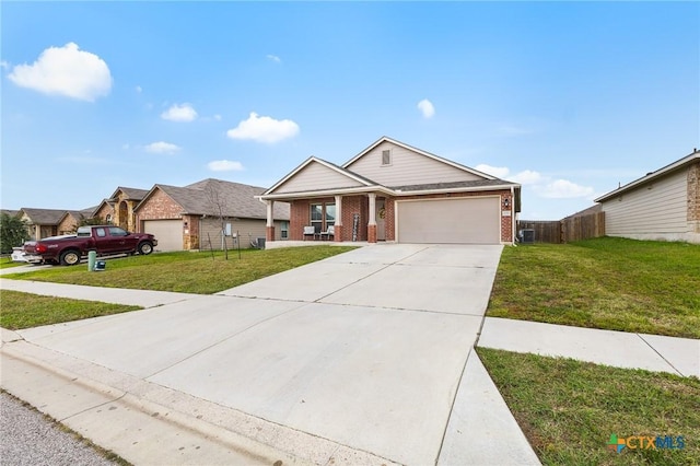 2020 Mallard Ct, Copperas Cove, TX 76522 - craftsman-style house featuring brick siding, concrete driveway, an attached garage, and a porch