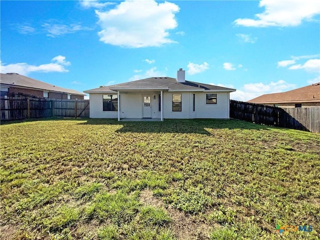 1116 Marlee Cir, Copperas Cove, TX 76522 - rear view of property featuring a fenced backyard and a chimney
