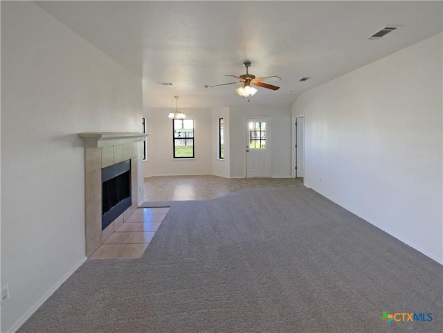 1116 Marlee Cir, Copperas Cove, TX 76522 - unfurnished living room featuring light carpet, a ceiling fan, a tile fireplace, and a chandelier