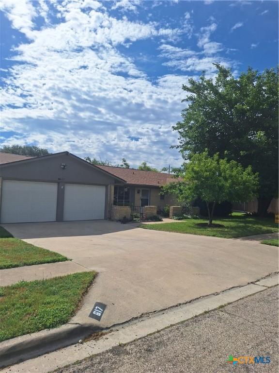 617 Allen St, Copperas Cove, TX 76522 - view of front facade featuring an attached garage and concrete driveway