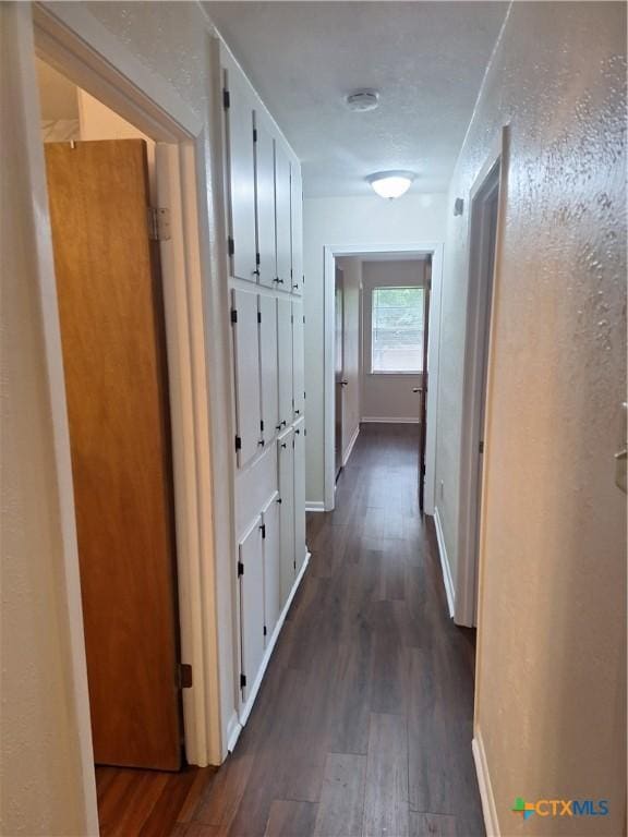 617 Allen St, Copperas Cove, TX 76522 - corridor with dark wood-type flooring and baseboards