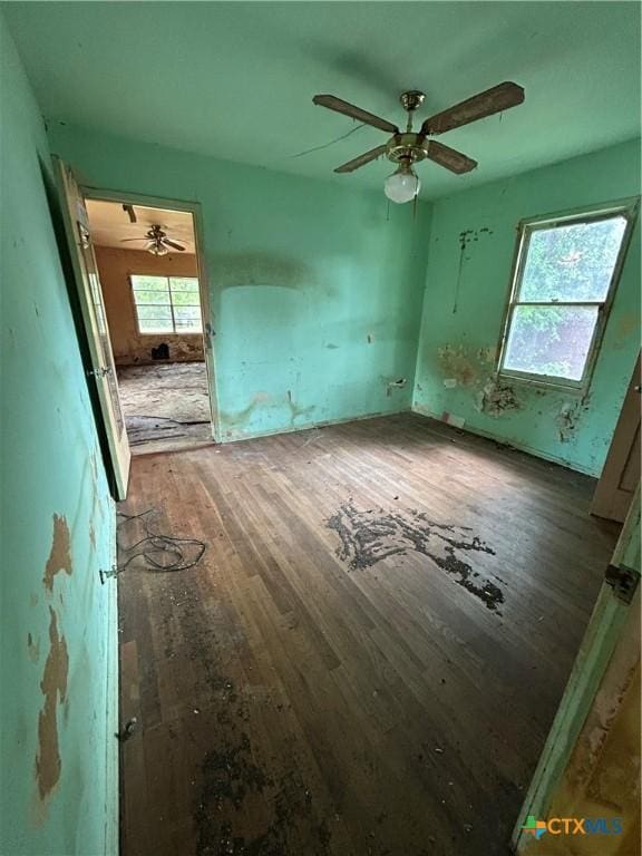 1610 E Rosebud Ave, Victoria, TX 77901 - empty room with hardwood / wood-style floors and a ceiling fan