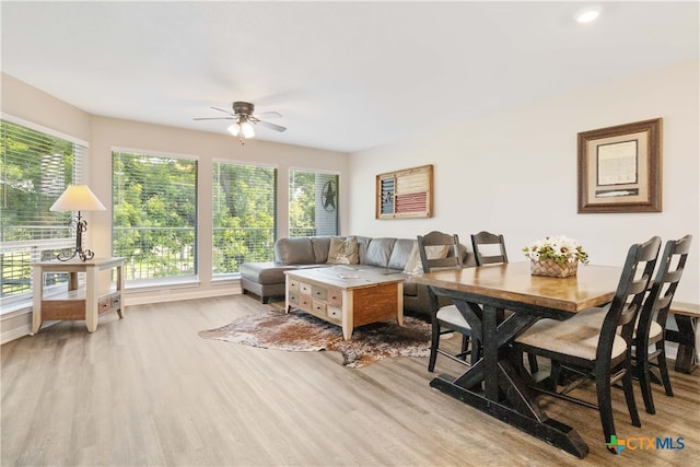 interior space with ceiling fan and light hardwood / wood-style floors