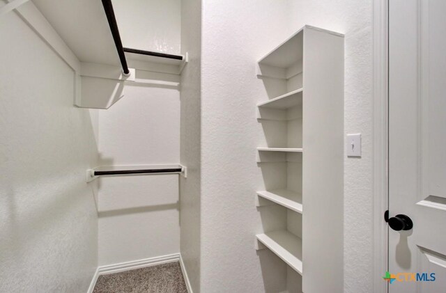 1236 Tuscan Vw, New Braunfels, TX 78130 - laundry room featuring hookup for an electric dryer, light wood-style flooring, baseboards, hookup for a gas dryer, and hookup for a washing machine