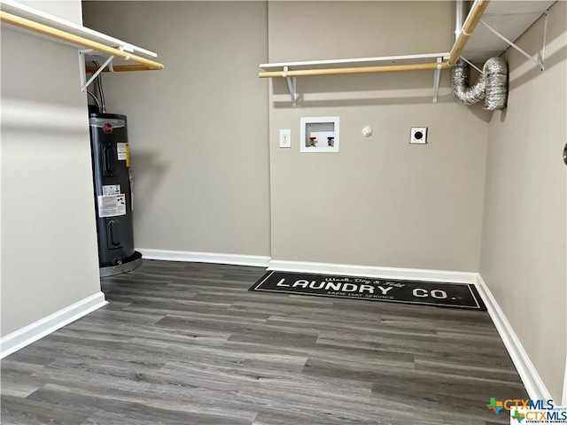 laundry area featuring electric water heater, washer hookup, dark wood-type flooring, and electric dryer hookup