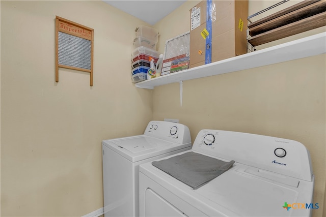 laundry room with separate washer and dryer