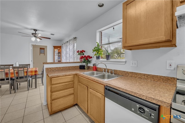 kitchen featuring sink, kitchen peninsula, ceiling fan, light tile patterned floors, and stainless steel dishwasher