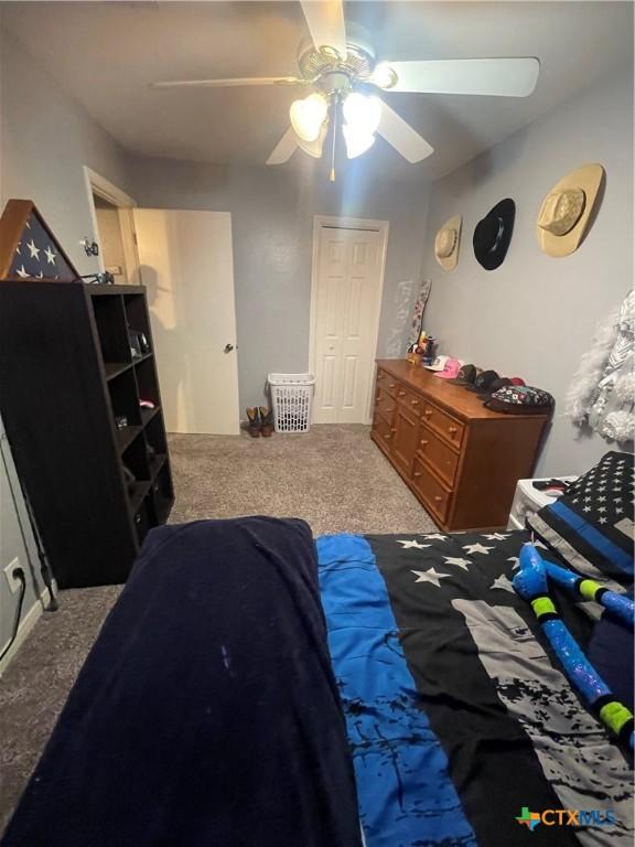 110 Idylwood Pl, Victoria, TX 77901 - bedroom with carpet flooring and a ceiling fan