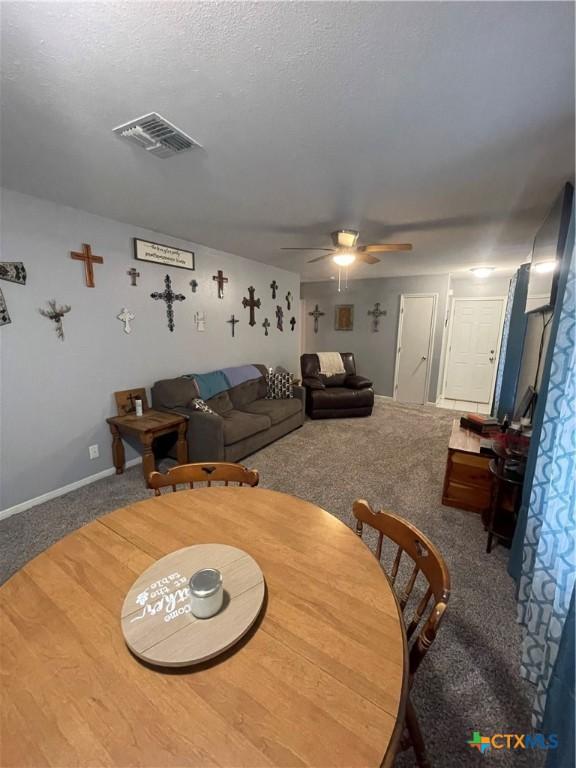 110 Idylwood Pl, Victoria, TX 77901 - dining room with carpet flooring, a ceiling fan, and baseboards