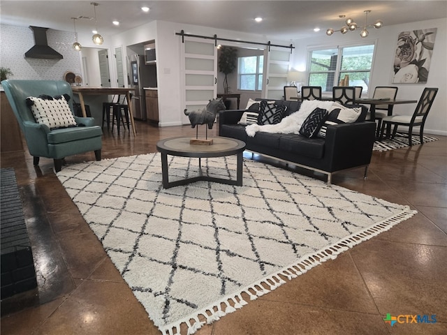 2302 Brooklawn Dr, Temple, TX 76502 - living area featuring a barn door and recessed lighting