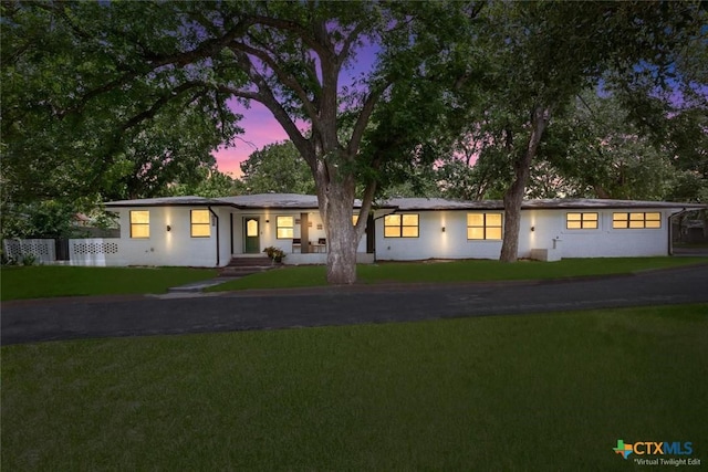 2302 Brooklawn Dr, Temple, TX 76502 - single story home featuring a front lawn and stucco siding