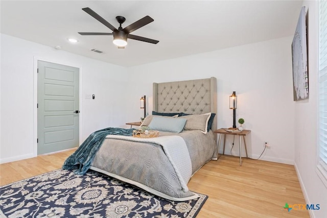 2302 Brooklawn Dr, Temple, TX 76502 - bedroom featuring light wood-style flooring, a ceiling fan, and recessed lighting