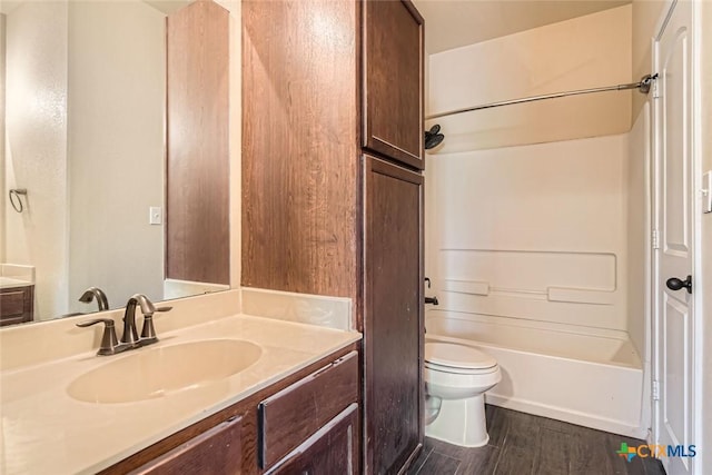 101 Creekside Villa Dr, Kyle, TX 78640 - full bath with vanity, wood finished floors, and shower / washtub combination