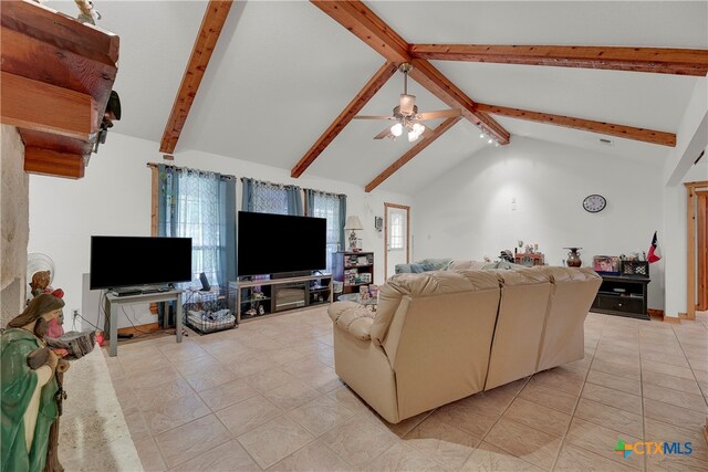 living room with high vaulted ceiling, a healthy amount of sunlight, ceiling fan, and beam ceiling