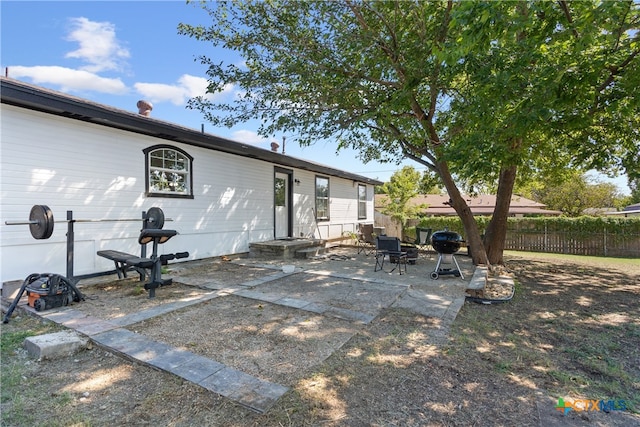 rear view of property with a patio