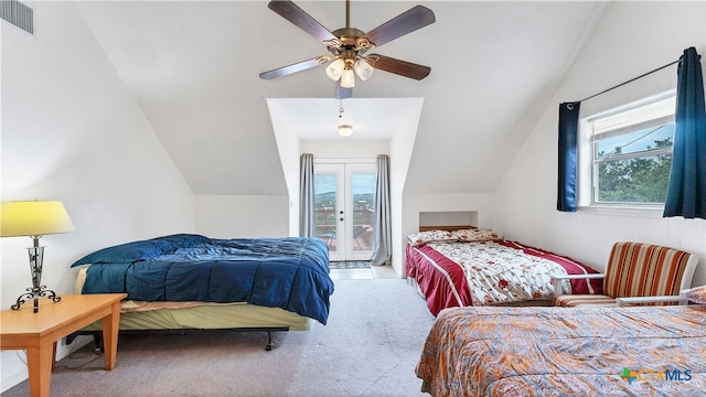 bedroom featuring ceiling fan, multiple windows, lofted ceiling, and access to outside