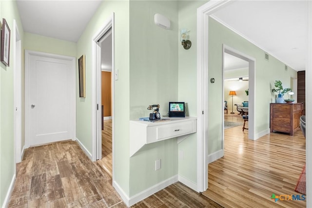 hallway featuring light wood-type flooring