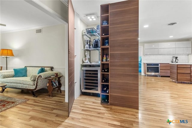 pantry featuring beverage cooler